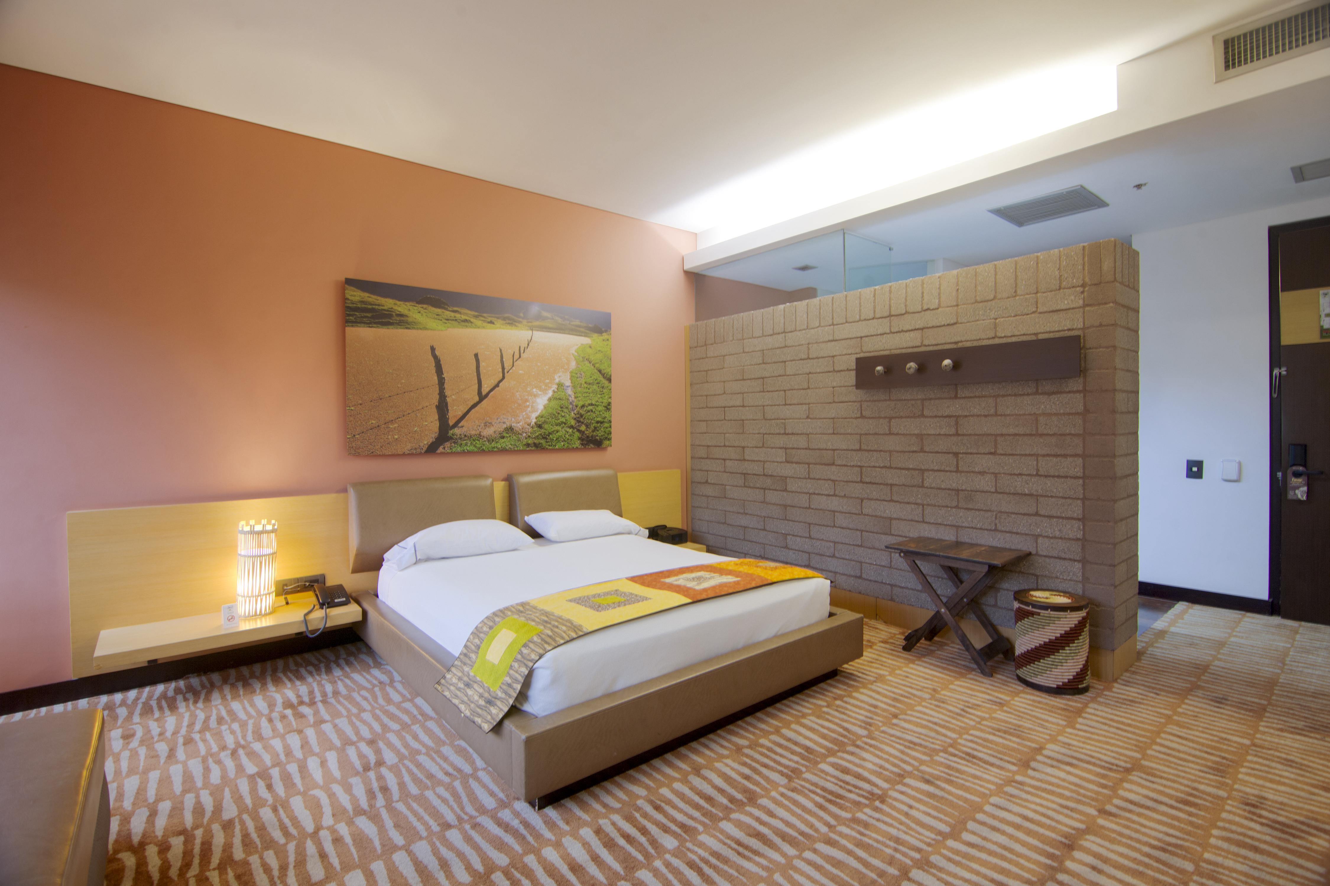 ディエス ホテル メデジン エクステリア 写真 A bedroom at the hotel