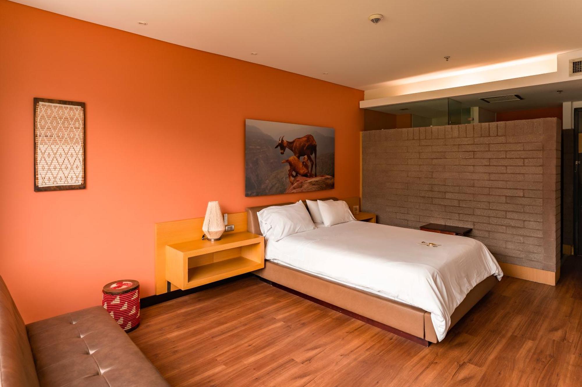 ディエス ホテル メデジン エクステリア 写真 A bedroom at the hotel